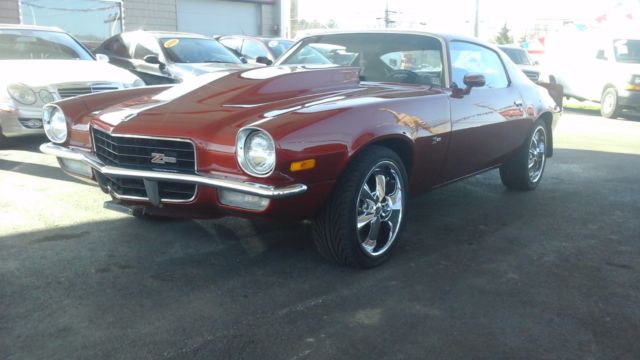 1972 chevy camaro z28 4 speed. burnt orange 355 aluminum heads small cam