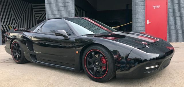 black acura nsx 3.0l v6 with custom sorcery widebody