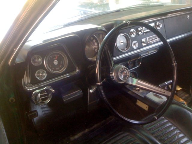 antique car - oldsmobile starfire 1965