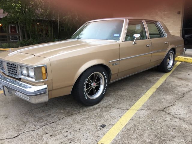 oldsmobile cutlass supreme sedan low miles no reserve!!
