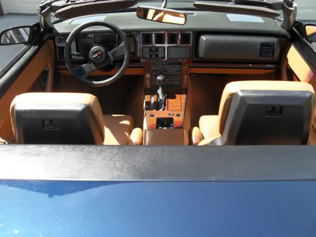 89 conv, auto, 70k mi, 1 owner, dark blue metallic. tan interior & top, grnd fx