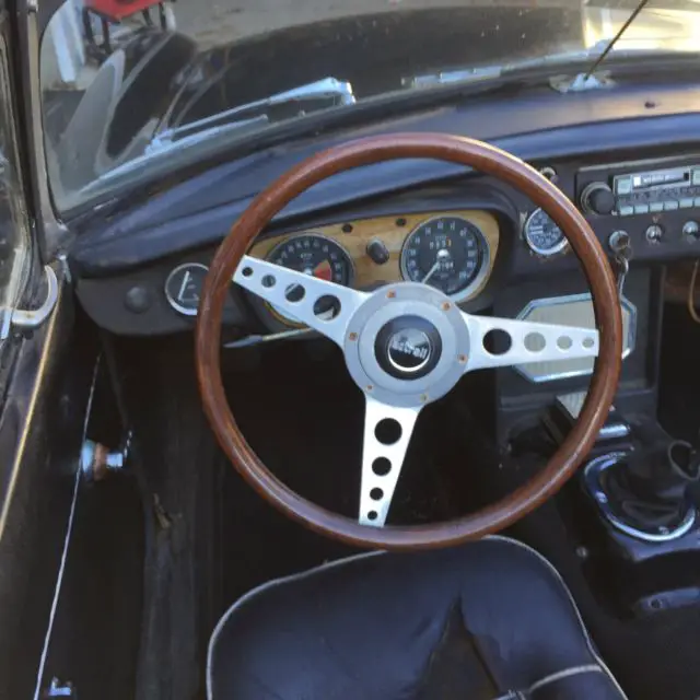 rare collectable original 1966 mgb. wire wheels, chrome bumpers