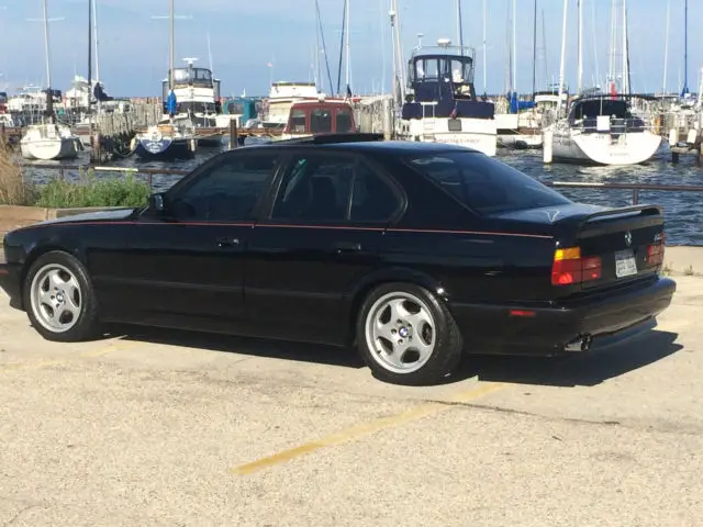 rare black on black last of the handbuildt e34 bmw m5's with dinan stroker 3.9l