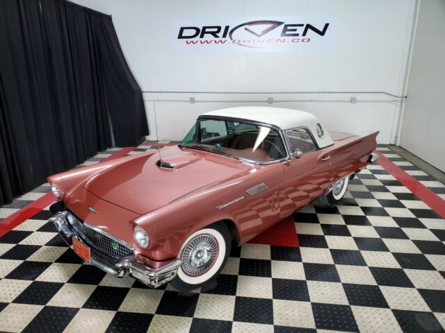 gorgeous 1957 showpiece in thunderbird bronze. pw, ac, t&c tunes, martini ringer