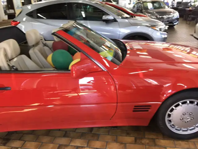 1991 mercedes convertible 500sl two door- red with black top