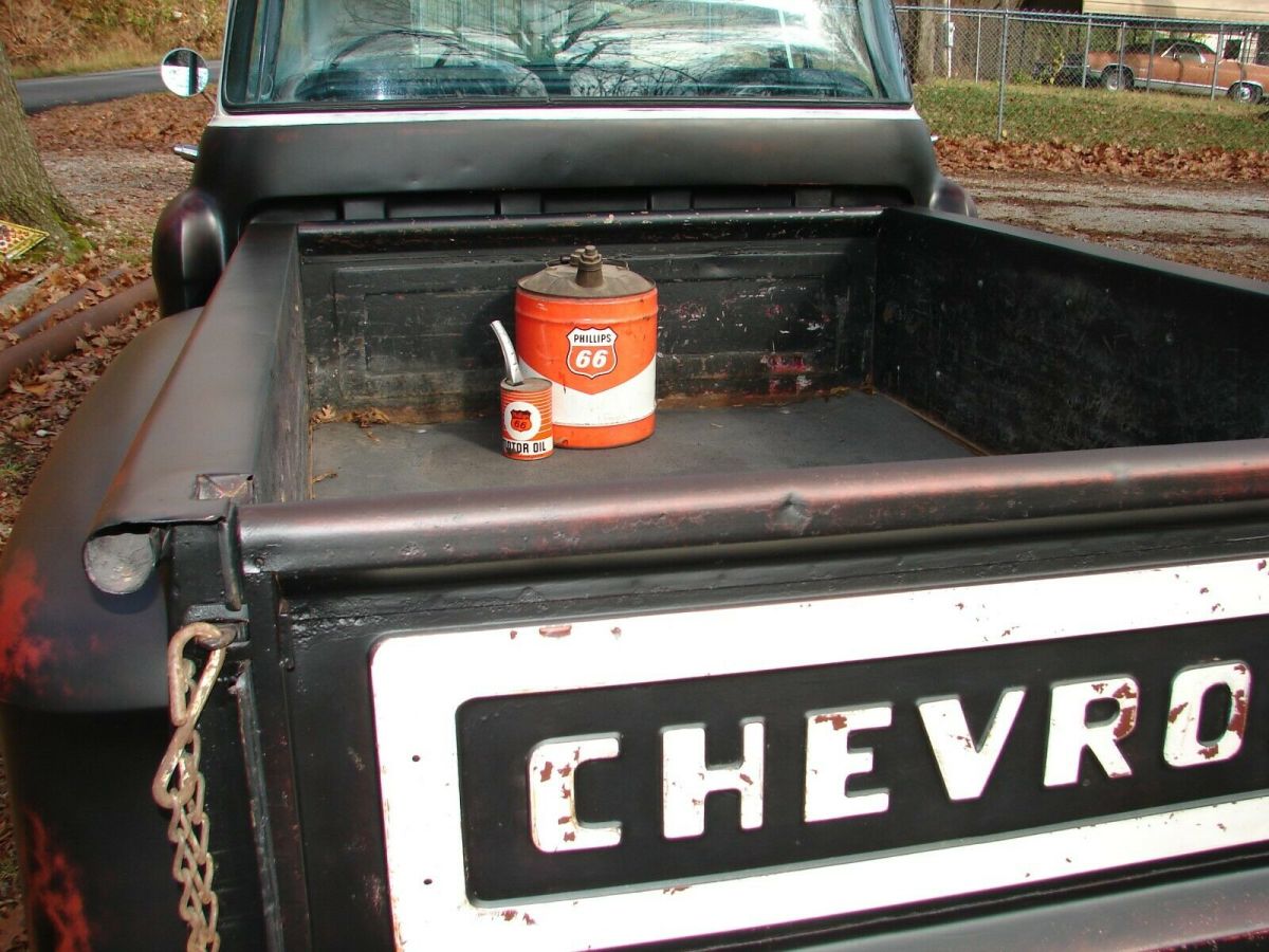 1959 chevy apache big glass with vintage phillips 66 gas and oil advertising