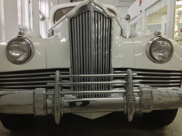 white 1942 packard 180 touring limousine