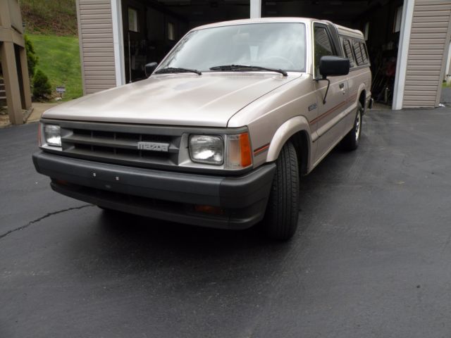 1988 mazda b2200 w/ cap - 49k original miles! - 4cyl auto w/ a/c - clean