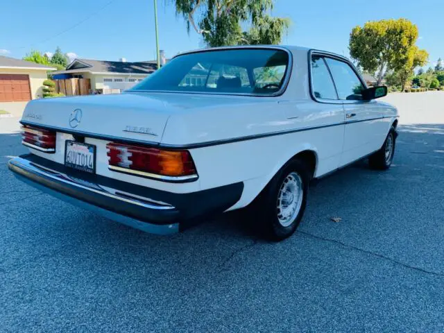 1981 mercedes 300cd, white sunroof coupe. tan interior. california car