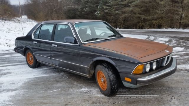 super cool custom 1985 bmw 735i with burgundy interior