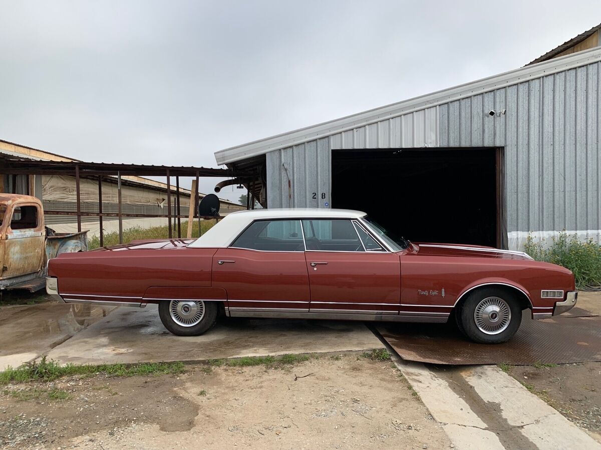 1966 oldsmobile 98 sedan red rwd automatic