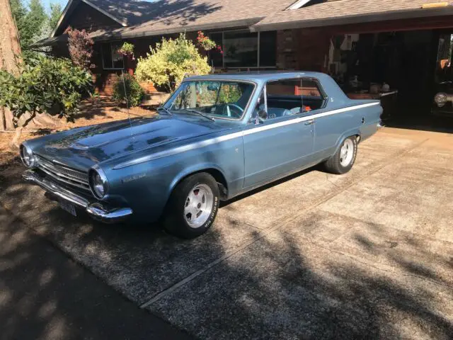 a '64 dart, frame-off restored in 1992; and powered with a 340 cubic inch engine