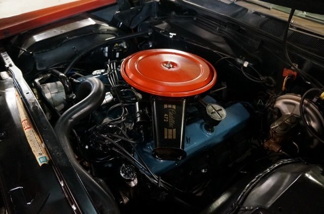 1968 cadillac coupe deville red