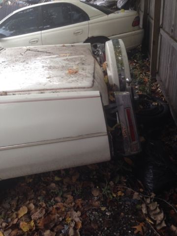white cadillac fleetwood