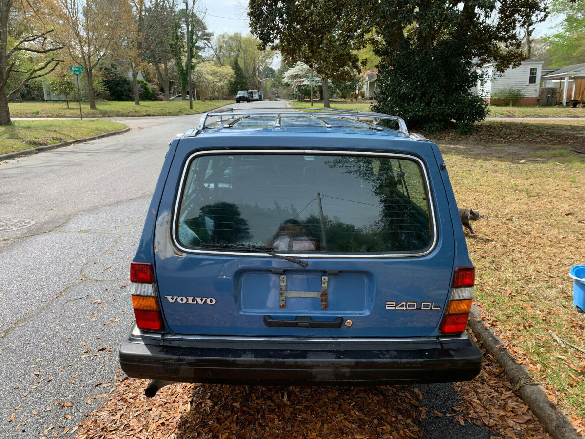 1989 volvo 240 dl wagon; 213,479 miles; manual transmission