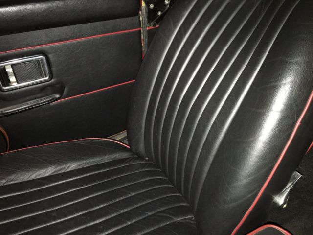 sweet little red 1973 mgb roadster convertible with factory overdrive