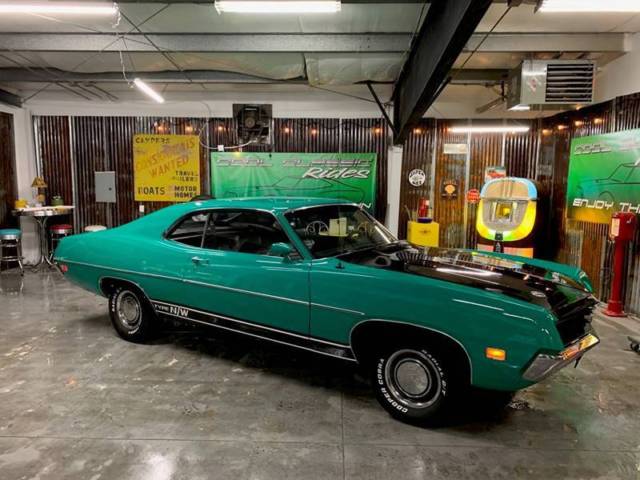 turquoise ford torino with 72,332 miles available now!
