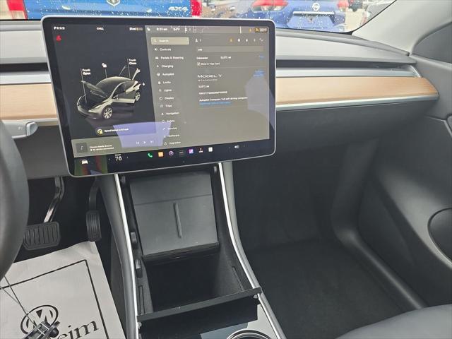 2021 tesla model y standard range rear-wheel drive