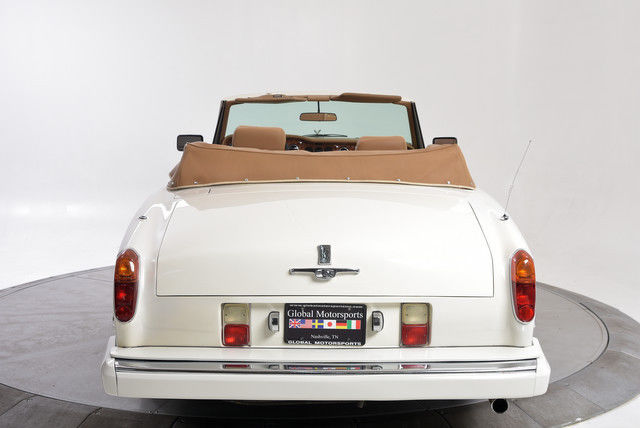west coast well serviced rolls royce corniche in white over tan