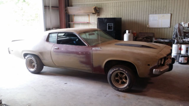 two 1973 plymouth roadrunners!