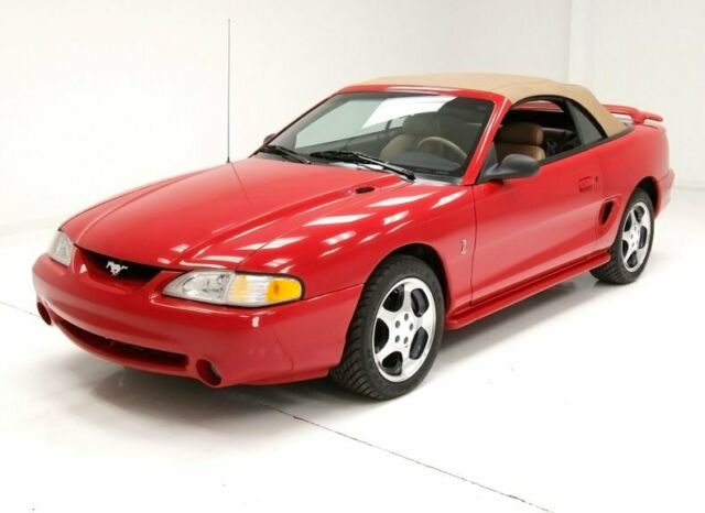 low miles showroom condition 5.0 v8 5 speed beautiful stitched tan leather