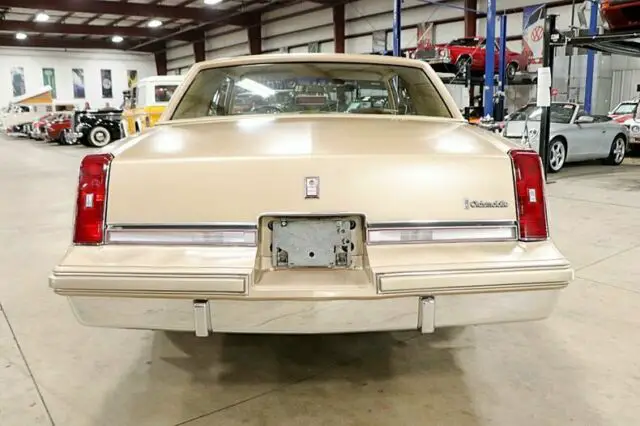 1986 oldsmobile cutlass supreme 82193 miles tan coupe 5.0l v8 4-speed automatic