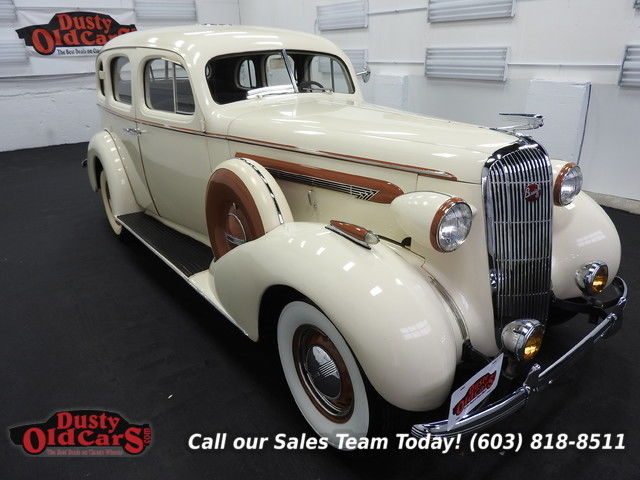 1936 tan runs drives body vgood 320i8 3spd man!