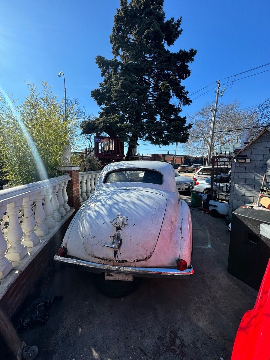 1942 studebaker commander white sedan