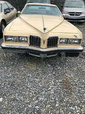 1977 pontiac grand prix coupe yellow rwd automatic 2 door hard top