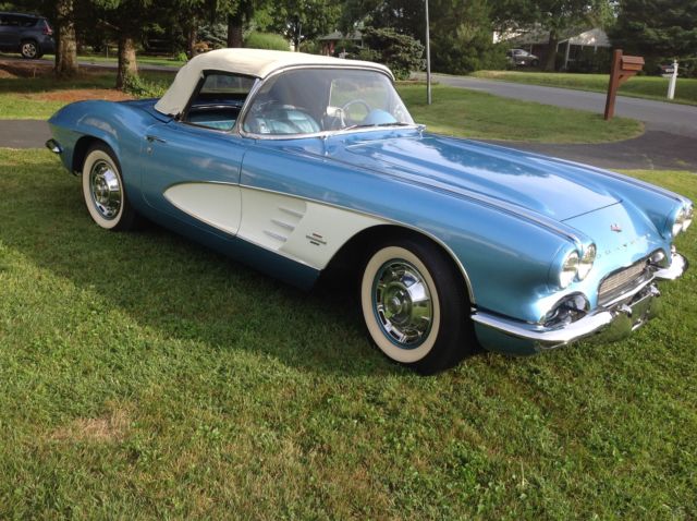 1961 jewel blue corvette with white convertibletop