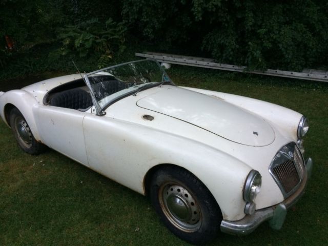 1961 mga convertible with fiberglass hard top, many extra parts