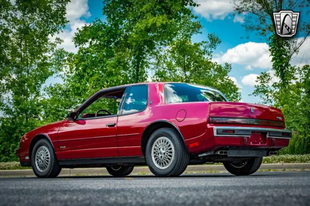 maroon 1988 oldsmobile toronado coupe 3.8l v6 f 4- speed automatic w/ elec. o