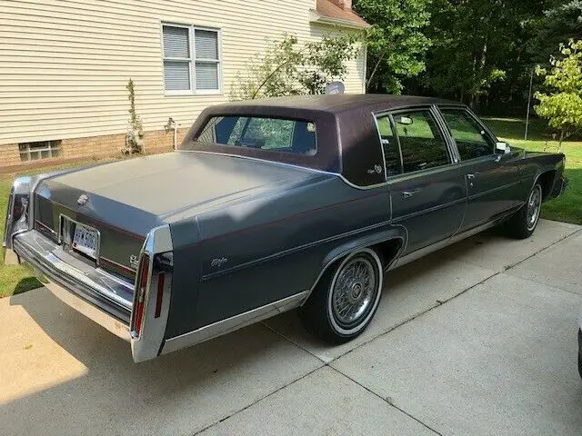 1988 cadillac brougham academy grey with prima cloth dark maroon seats