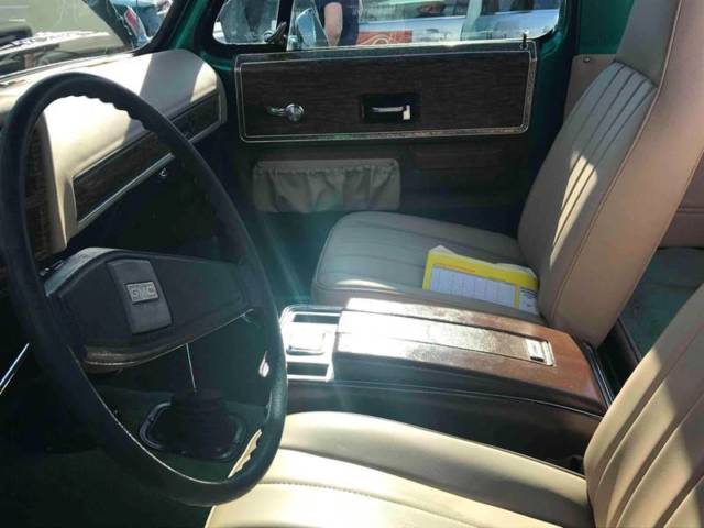 green gmc jimmy with warranty available now!