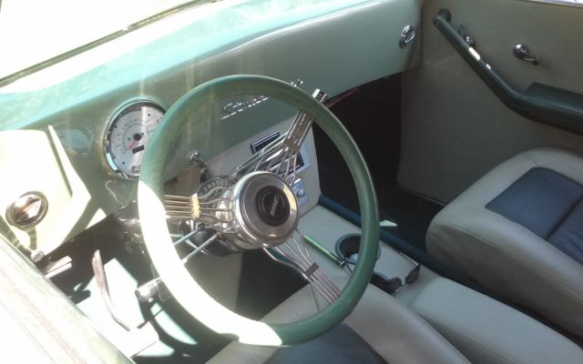 champion convertible. green with leather interior. excellent condition