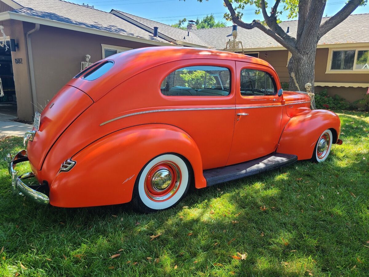 1940 ford deluxe sedan orange tudor