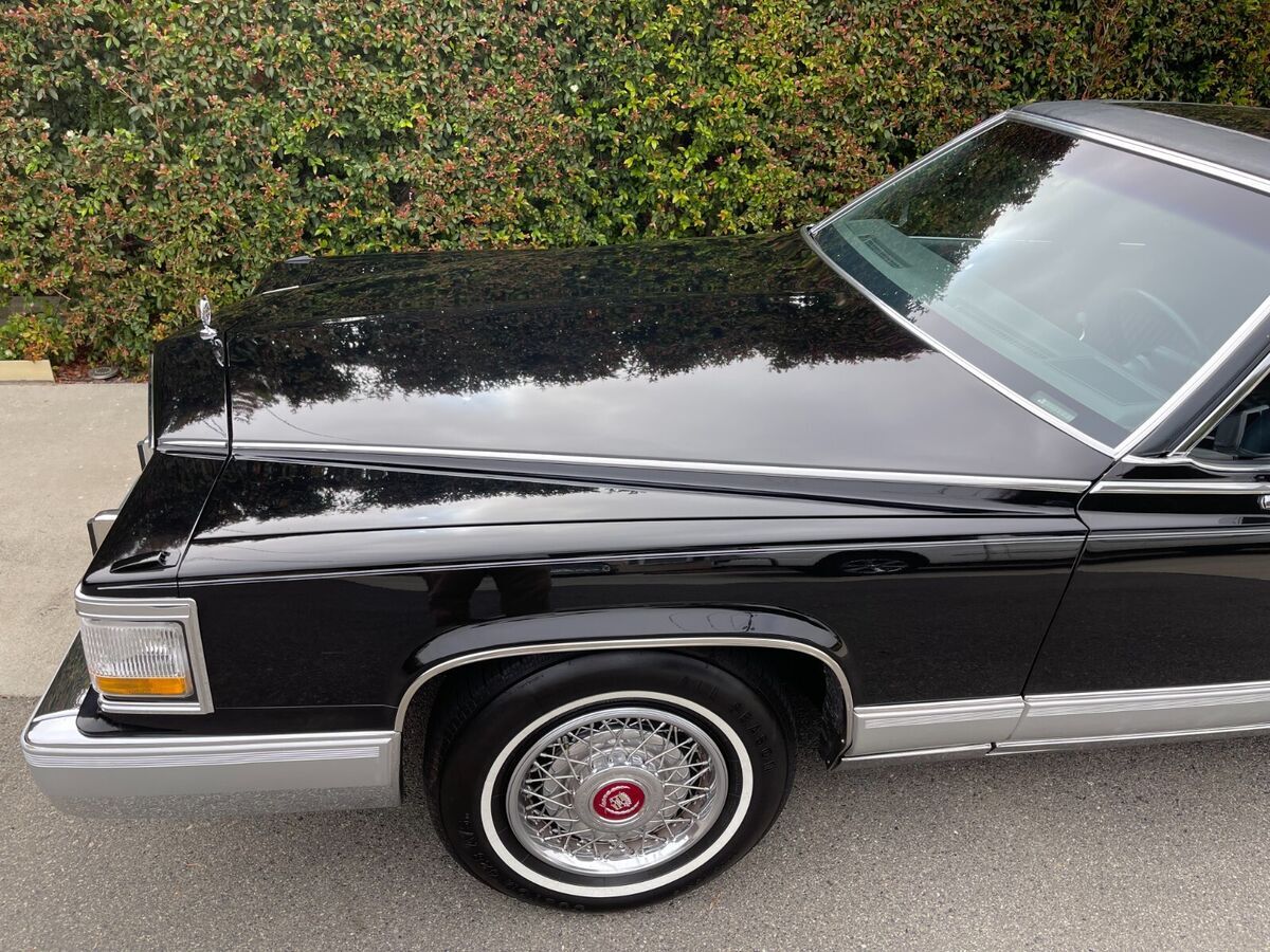 cadillac brougham black 74k
