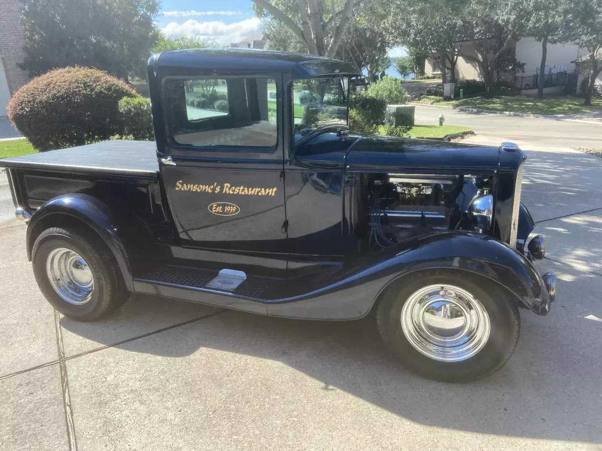 all steel body & fenders, '32 grille, wood-plank truck bed. small block chevy v8