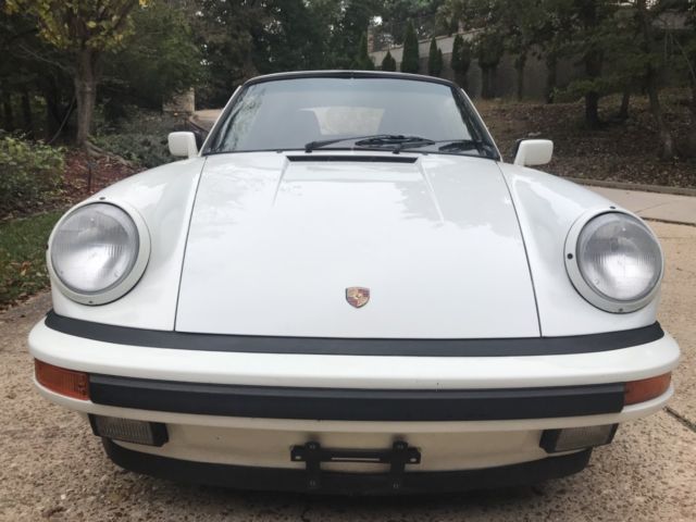 mint porsche 911 cabriolet with only 63,000 miles. g50 five speed manual, ac