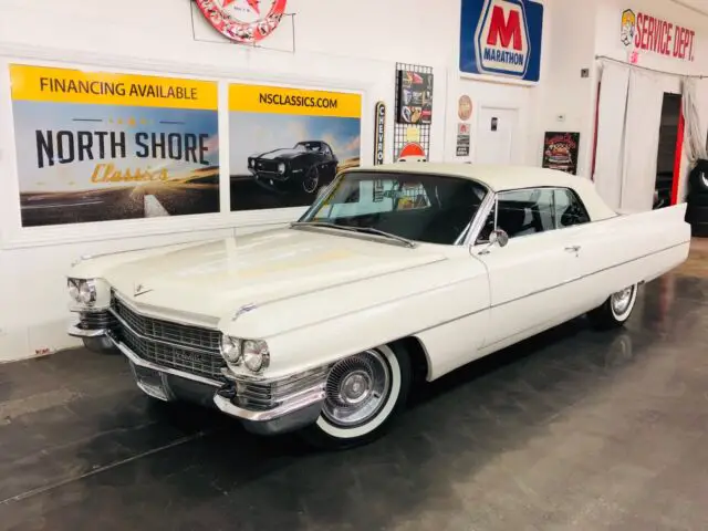 aspen white cadillac deville with 61,768 miles available now!