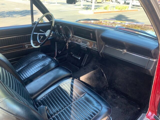 a well cared for rambler ambassador with a 327 amc motor