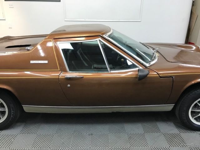 1973 lotus europa twin cam. tawny brown, black trim. very original and complete