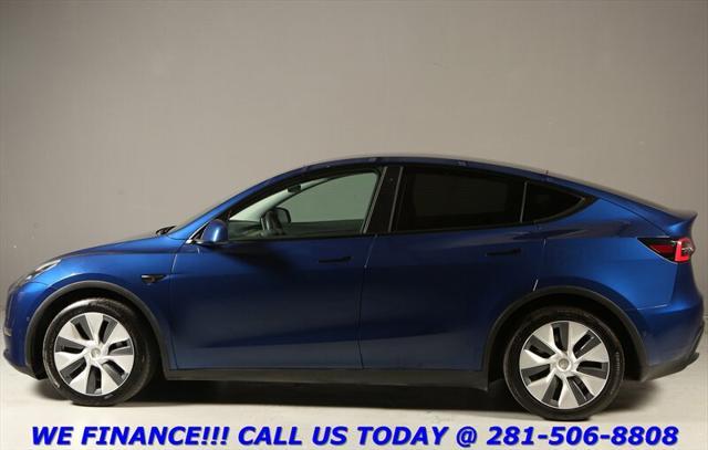2021 tesla model y standard range rear-wheel drive