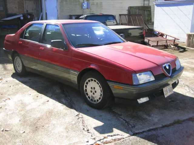 alfa romeo 164 fwd sedan with automatic and sunroof. red with gray interior