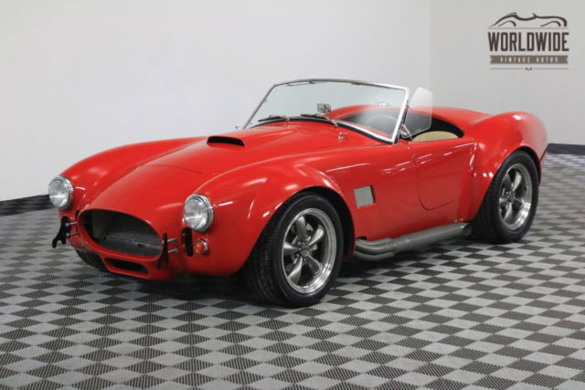 1965 red factory five cobra 4.6l fi motor. fast!