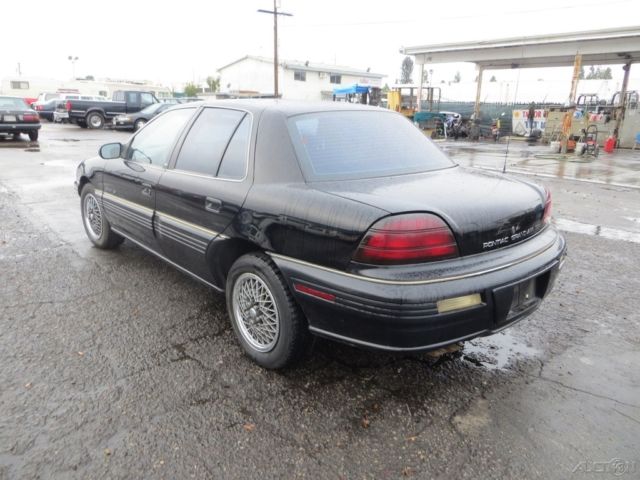1994 pontiac grand am se used 2.3l i4 8v automatic sedan premium no reserve