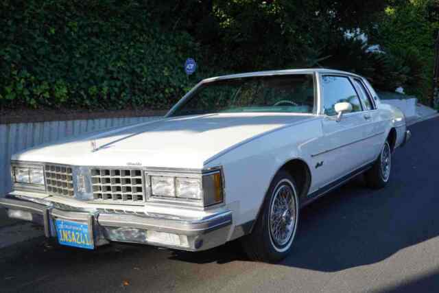 1985 oldsmobile delta 88 coupe white rwd automatic royale brougham