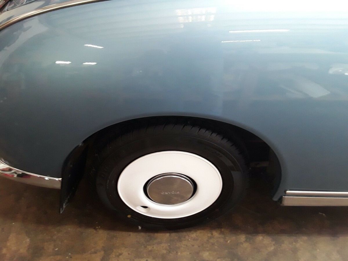 1991 nissan figaro convertible,custom paint,rust free,florida car,new top/int