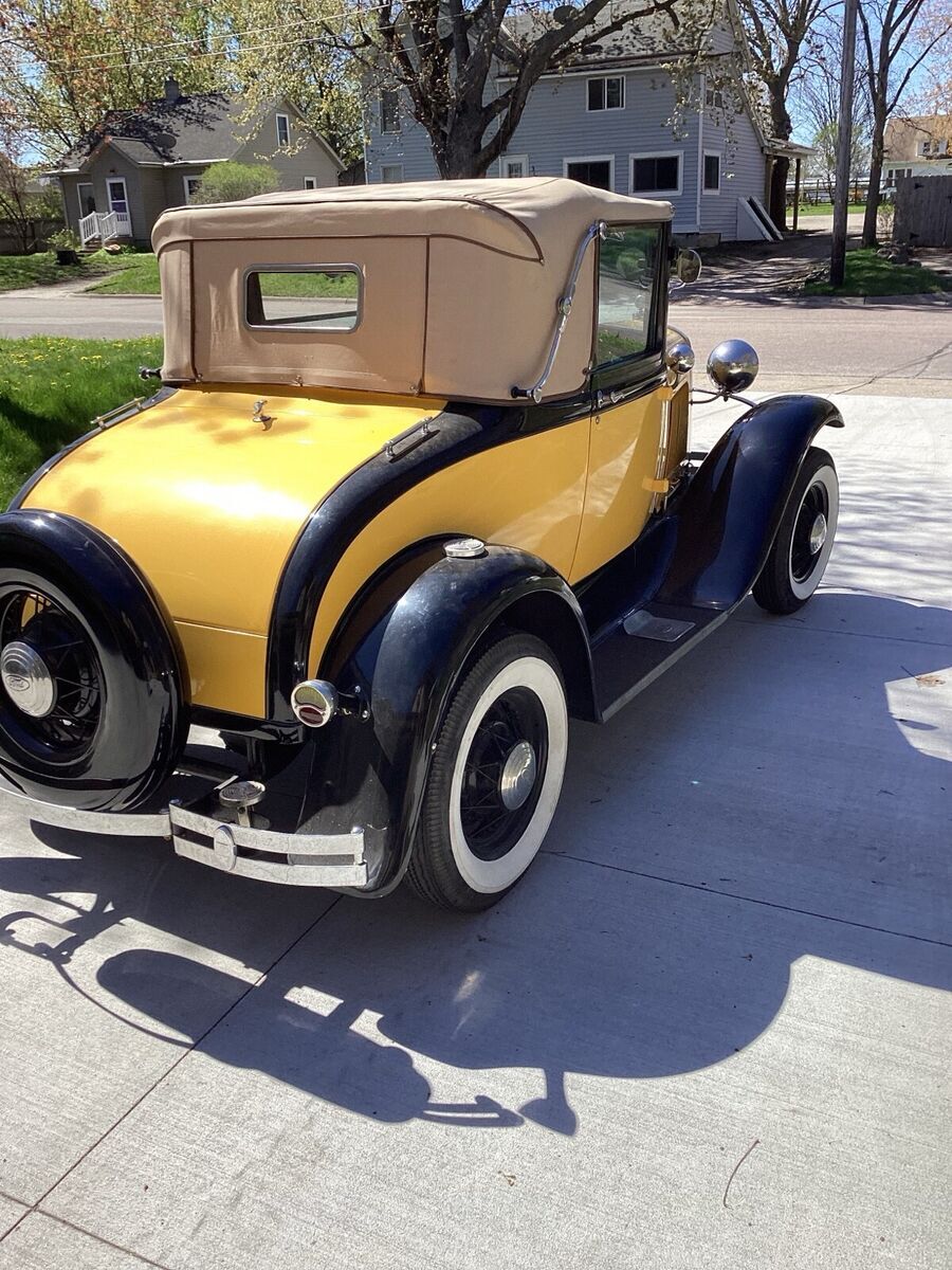 1931 ford model a yellow cabriolet
