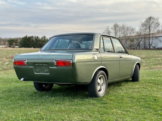 1972 datsun 510 sedan green rwd manual